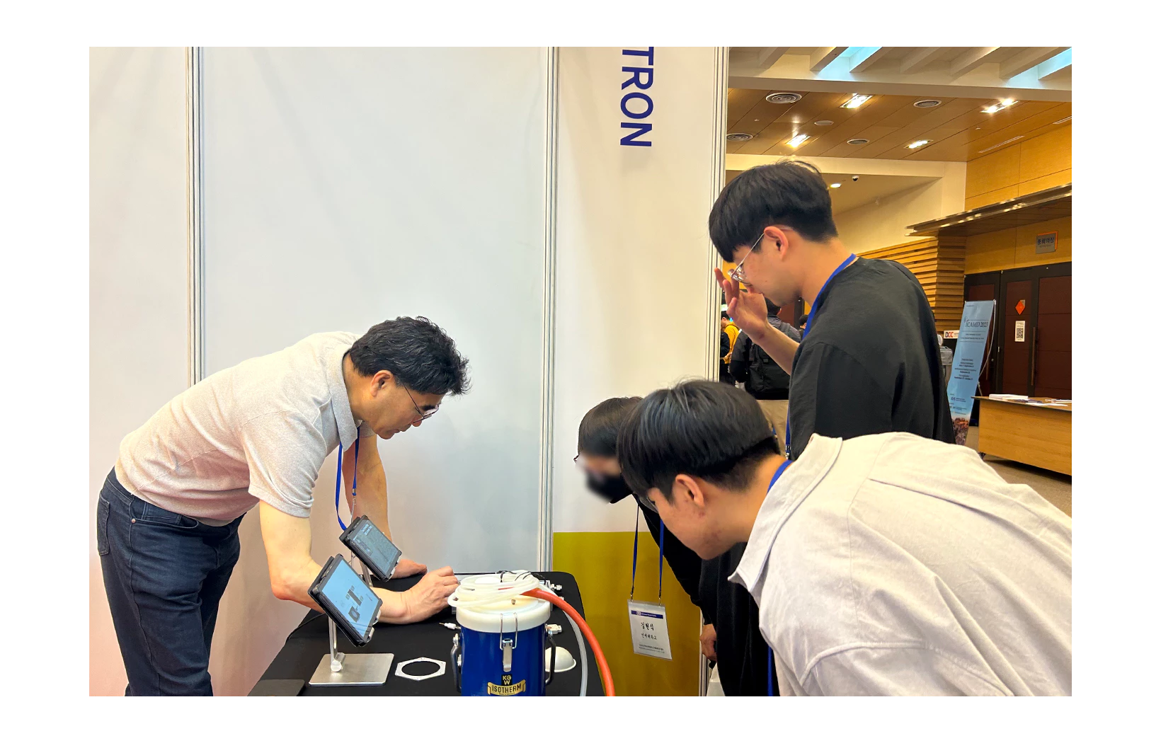 Nextron's CEO explaining MPS to interested customers at the 2023 KPS Spring Meeting